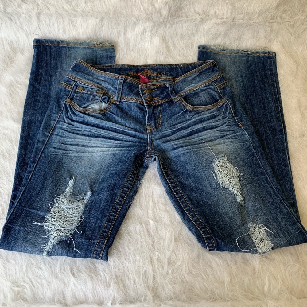 Distressed boot cut jeans
